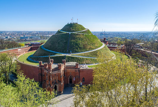Kosciuszko Mound (Kopiec Kościuszki). Krakow landmark, Poland. Erected in 1823 to commemorate Tadedeusz Kosciuszko, and the chapel of St. Bronislawa. Aerial view in sunrise light