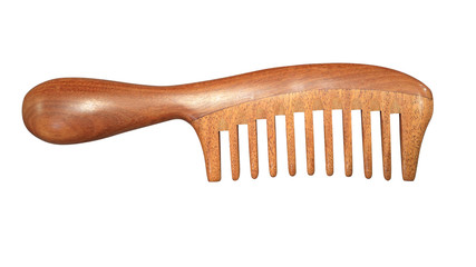 Sandalwood comb. Comb of sandalwood. Isolated image.
