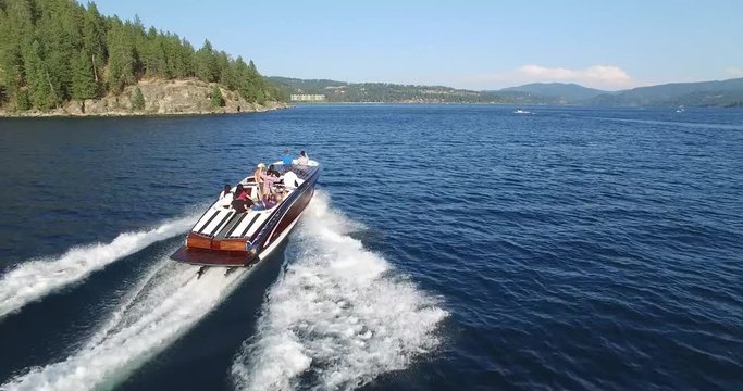 Aerial View Following Behind Fast Moving Speedboat on Lake Coeur d'Alene, Idaho