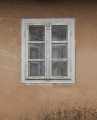 Close view old white wooden window on