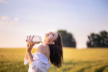 portrait of young woman in the field