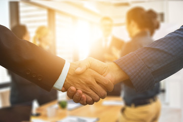 Close up people hands shake business partnership success,Shake hand concept,Business team meeting in office teamwork planing marketing project