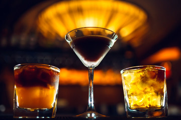Alcoholic cocktails on the bar table.