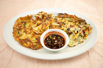 Cuttlefish, zucchini, spring onion and carrot pancake