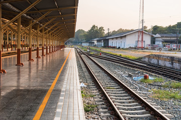 Fototapeta na wymiar Chiang Mai , Thailand - January, 18, 2020 : Railroad tracks in chiang mai thailand.Crossing railway track railway point on tracks soft lens landscape background.