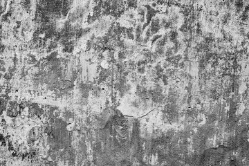 Texture of a concrete wall with cracks and scratches which can be used as a background