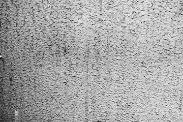 Texture of a metal wall with cracks and scratches which can be used as a background