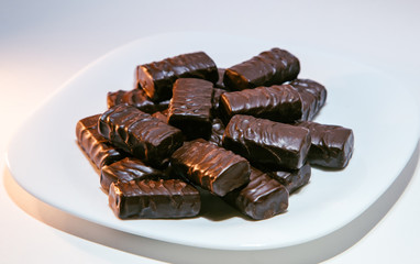 Delicious chocolates on a plate.