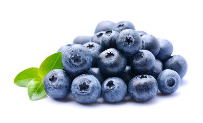 Blueberries with leaves .