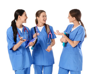 Female medical students on white background