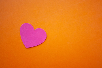 Love, valentines day, mothers day, women concept. Small paper heart shape on blue background top view copyspace