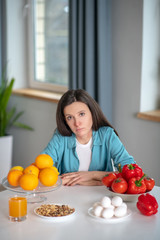 Woman with a runny nose feeling allergic to some products