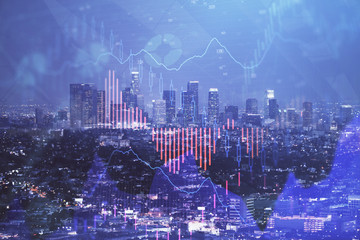 Plakat Financial graph on night city scape with tall buildings background double exposure. Analysis concept.