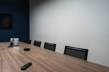 Room for meetings and negotiations in a modern office. Empty corporate room.