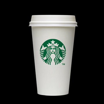 Los Angeles, CA - March 15, 2019: Starbucks Paper Cup. Starbucks Coffee with Logo Mermaid isolated on black Background.