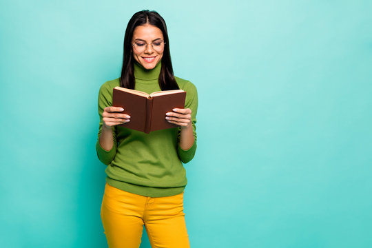 Portrait of her she nice attractive lovely focused intellectual cheerful cheery girl reading interesting scientific work isolated on bright vivid shine vibrant blue green turquoise color background