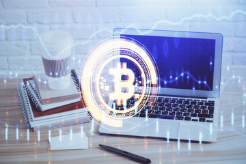 Fototapeta premium Double exposure of blockchain theme hologram and table with computer background. Concept of bitcoin crypto currency.