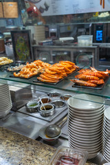 Cooked shrimps for cooking ingredients at kitchen counter in restaurant