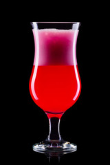 Strawberry cocktail in hurricane glass isolated on black background