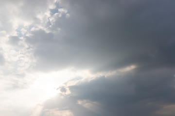 Sun shining thru the cloud in evening time