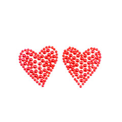 Two red hearts. Decorative stickers on bright background.