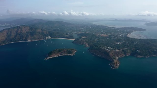 Aerial view of the Promthep Cape on the south of Phuket island in Thailand. Orbiting around southernmost tip of Phuket island.