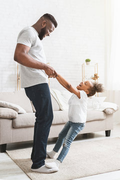 Playful Daughter Staying On Dad Feet, Learning Dancing