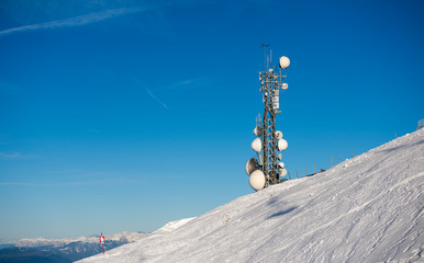 Transmission towers in the mountains. Alps - Dolomites
