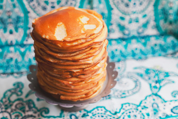 Traditional Russian ruddy pancakes on Shrovetide
