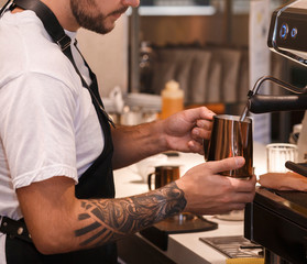 Unrecognizable Barista Making Coffee Working In Cafe Indoor, Cropped