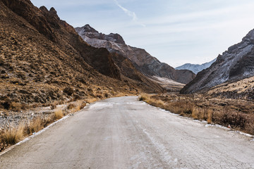 the gravel road on the snow mountain