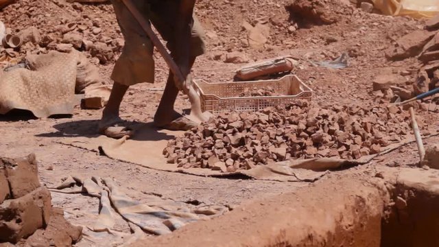 Preparing raw clay pices for water