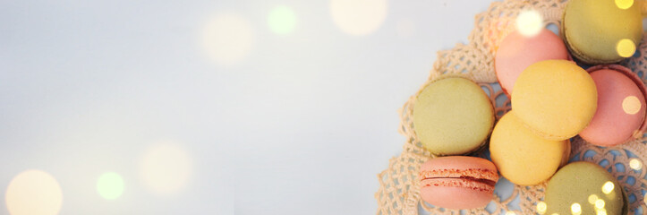 Spring background with blossom and macaroon