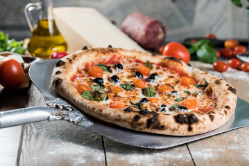 Serving a italian pizza. food photography recipe idea