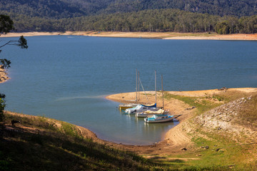 Recreational boats on Lake Tinaroo in Queensland, Australia during drought