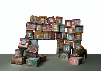 House of wooden blocks and cubes, falling apart