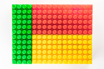 Stylized national flag of Benin on the white background for easy extraction maked by means of children building sets