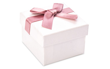 White box for jewelry with a pink bow