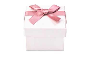 White box for jewelry with a pink bow
