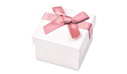 White box for jewelry with a pink bow