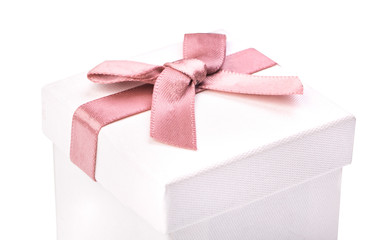 White box for jewelry with a pink bow