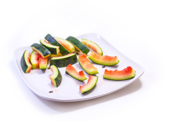 Watermelon rind in a white plate.