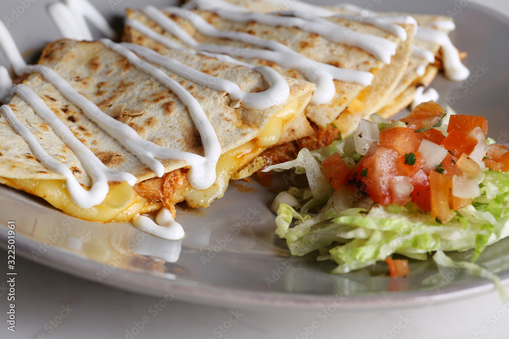 Wall mural Quesadilla with cheese,mushroom,onions and salad