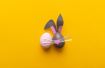 Cute creative photo with easter eggs, some eggs like easter bunny