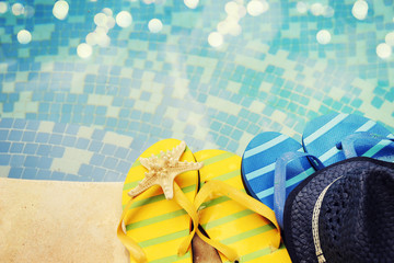 flip flops by the swimming pool