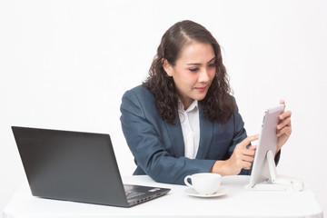 Beautiful young executive with her work and coffee