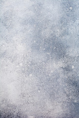 Light grey stone or slate wall.Grunge background.Top view.