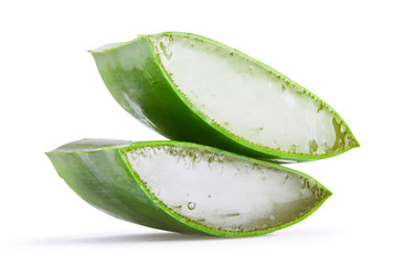 Sliced Aloe Vera closeup isolated on white background with clipping path. Aloe plant is used as main ingredient for natural organic renewal cosmetics, herbal medicine. Organic skin care concept. 