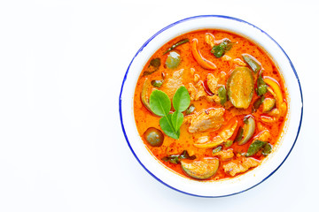 Red curry round eggplant with pork, white background. Copy space