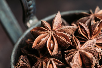 Dried anise stars on the rustic background. Selective focus. Shallow depth of field.